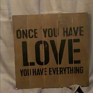 Wood and black box sign